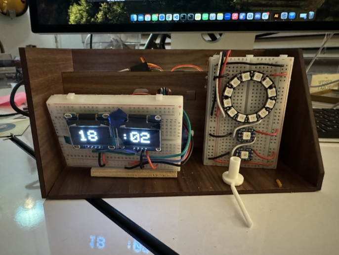 Unifinished electronic project with time clock screens and light ring